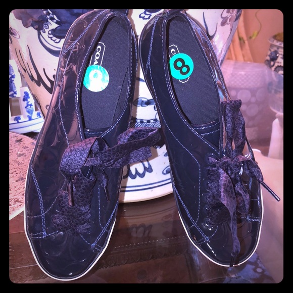 Navy blue Coach sneakers.  Runs a little large. More like a 8.5 or 9 - Picture 1 of 5